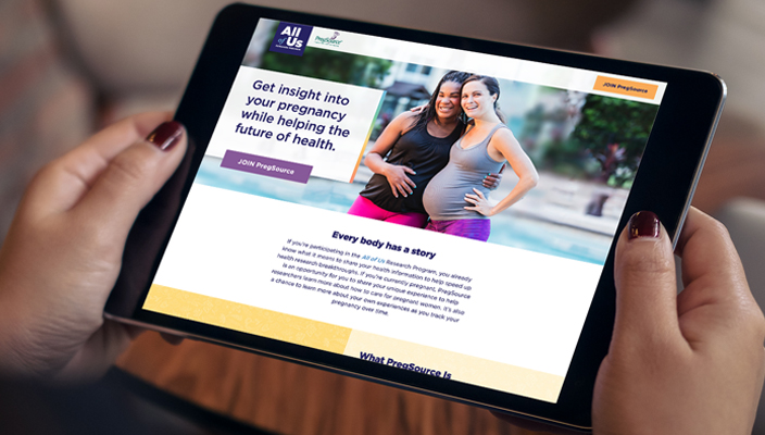 A pad computer displaying a screen shot of a page from the All of Us website inviting users to join PregSource.