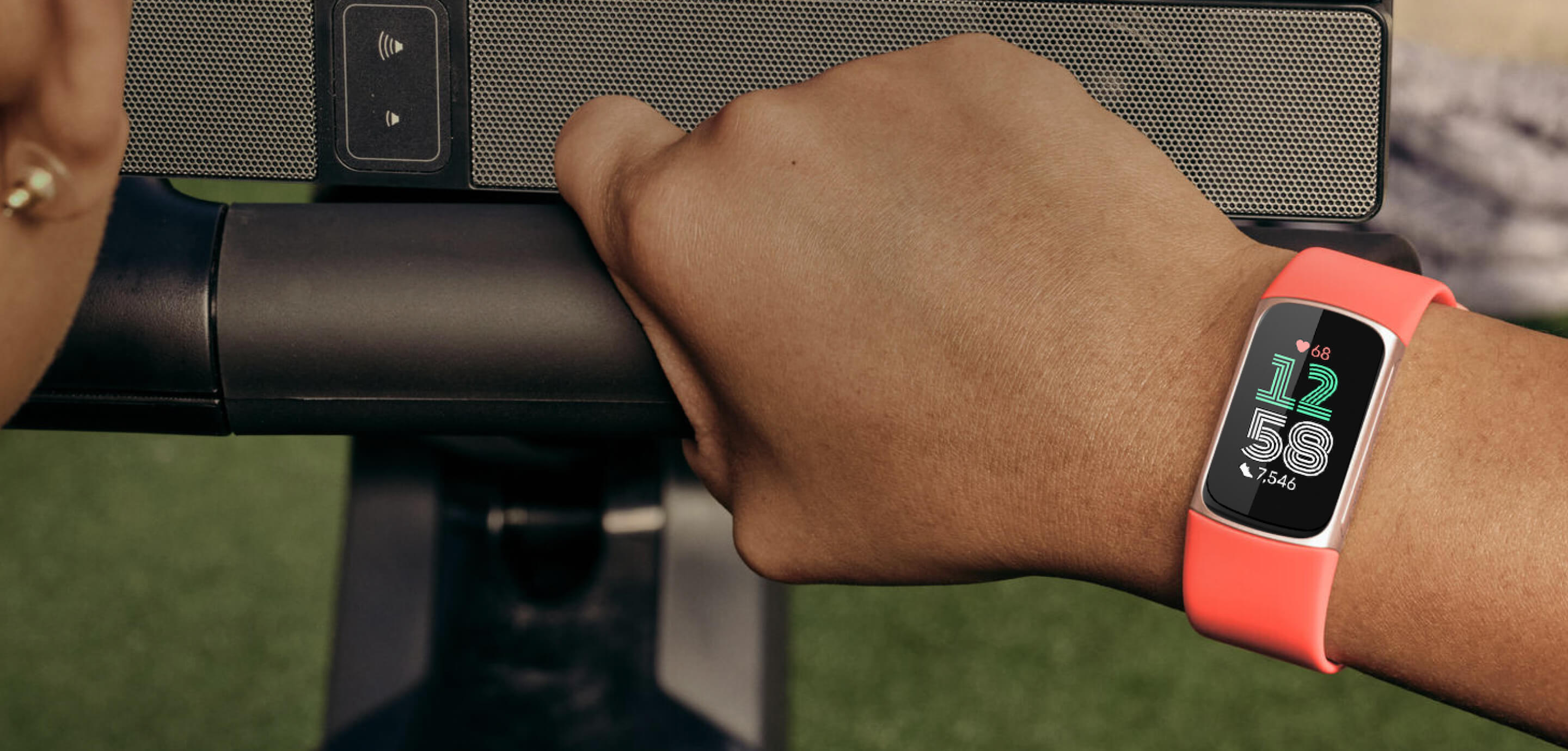 A smartwatch device on a person's wrist showing data.